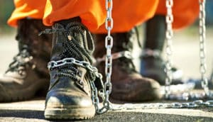 chains on boots of prisoners