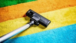 vacuum on colorful carpet (