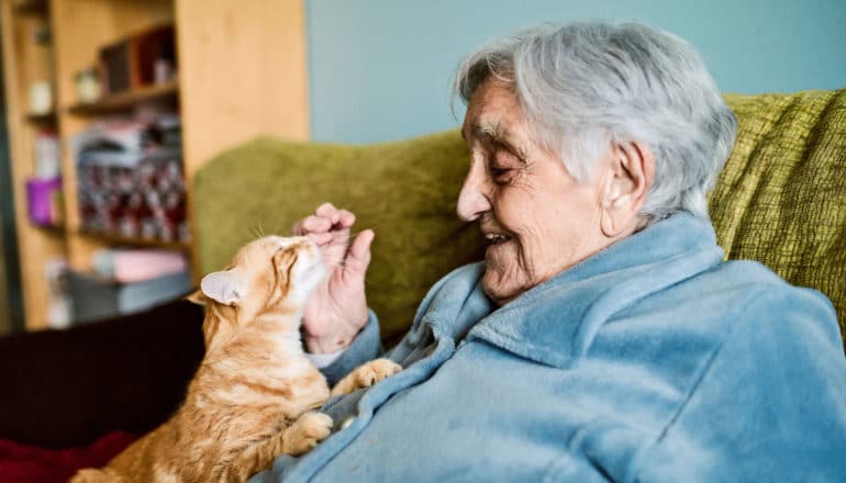 elderly woman with cat