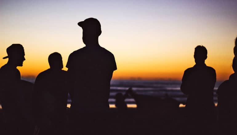 group of men in silhouette