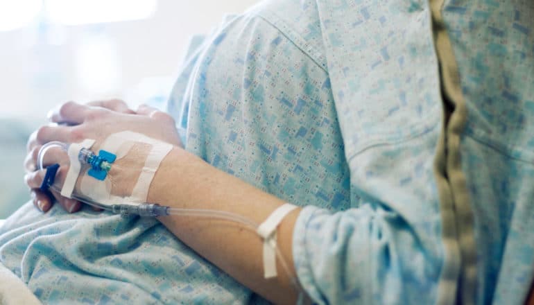pregnant woman in hospital gown - preeclampsia