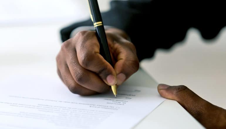 hand, pen, paperwork