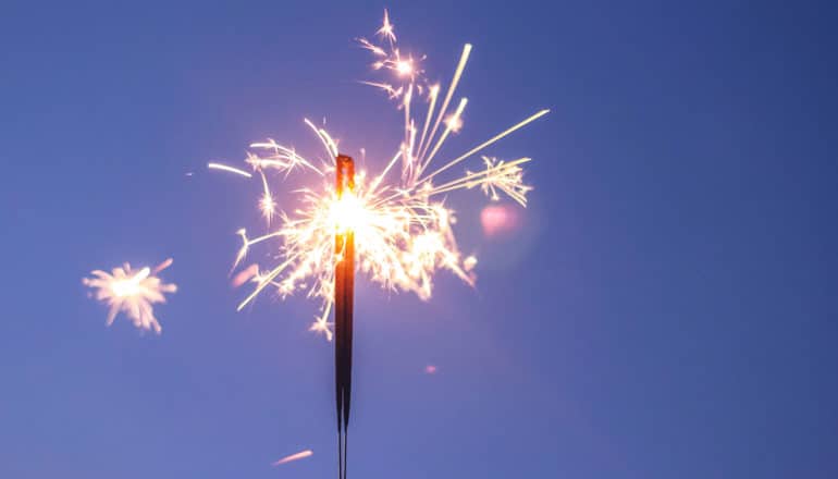 sparklers on dark blue (supernova concept)