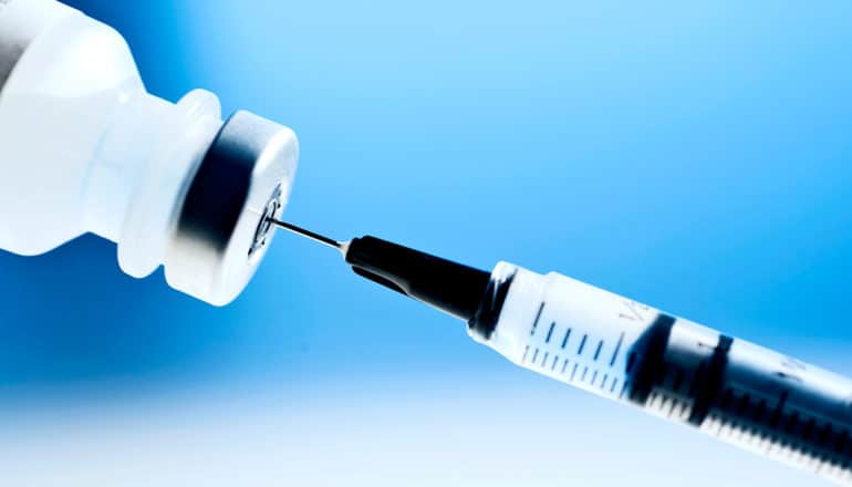 vaccine syringe (malaria concept)