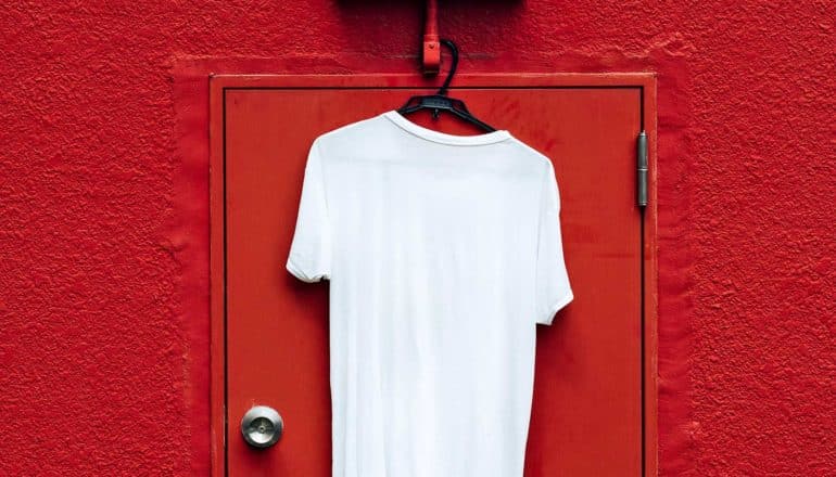 white t-shirt hanging (cheap clothes concept)