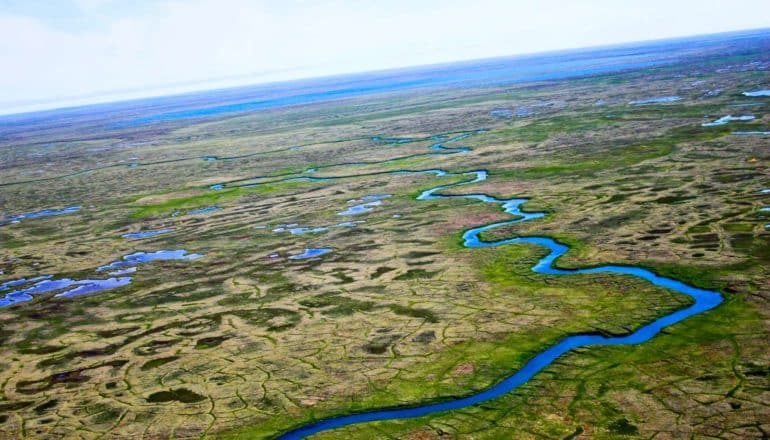 Arctica tundra with river and horizon