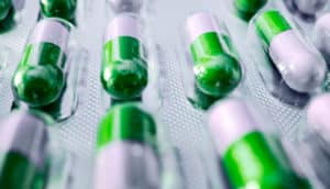 green pill pack (side effects concept)