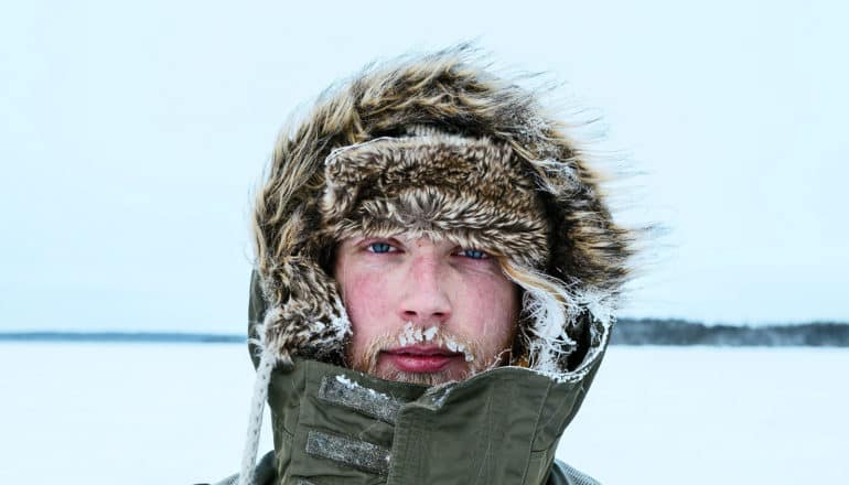 man out in cold (polar vortex concept)
