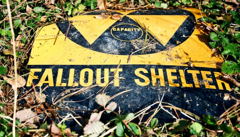 overgrown fallout shelter sign