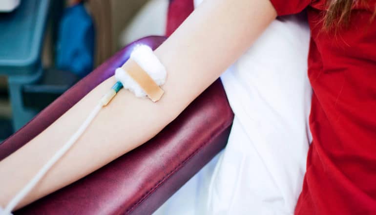 teen giving blood