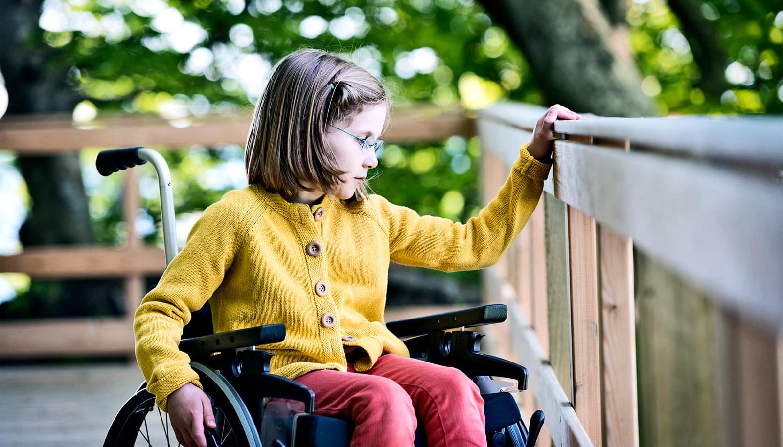 young girl in wheelchair