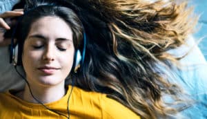 young woman listening to music