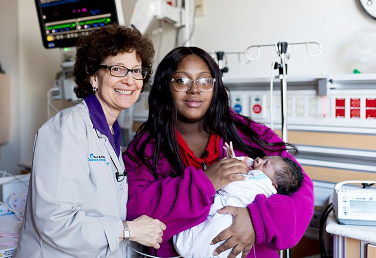 Amy Paller, new mother Taschana Taylor, and baby Grace.