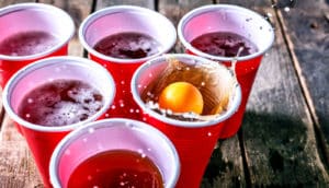 beer pong splash (college student drinking concept)
