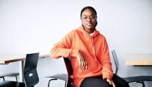 college student in orange hoodie (stem students concept)