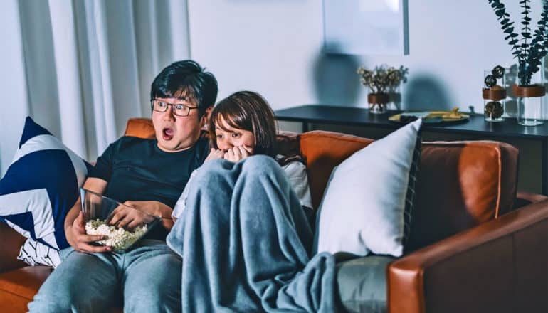 couple watching TV (netflix binge concept)
