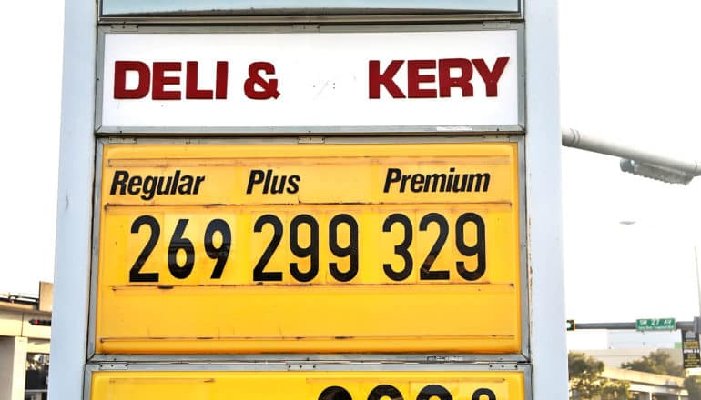 gas prices on yellow sign