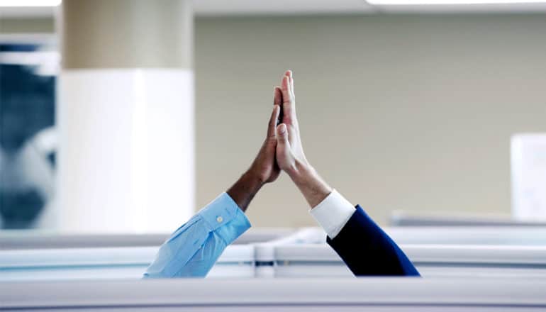 high five in cubicles (political polarization concept)