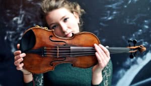 Violinist holding violin