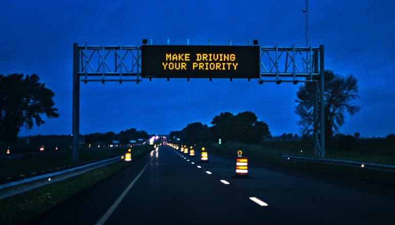 make driving your priority sign