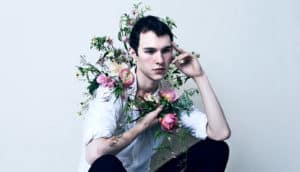 man thinking with flowers around his head (hippocampus concept)