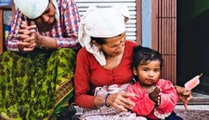 Older women with baby in Nepal village