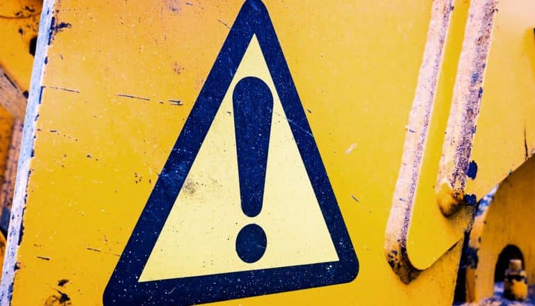 warning sign on equipment (artificial intelligence concept)