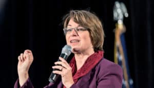 Amy Klobuchar with microphone