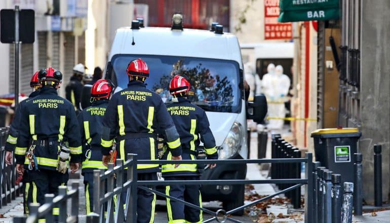 Parisian police officers and truck after anti-terror event in Paris