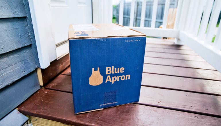 blue apron box on porch (meal kits concept)