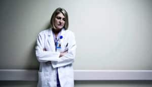 doctor thinking in hallway