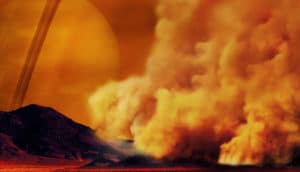 dust storm on titan with saturn on horizon