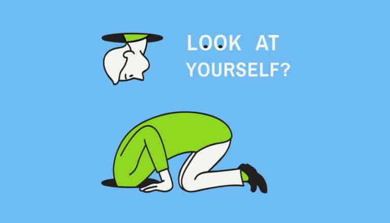 cartoon person with head in hole says "look at yourself?"