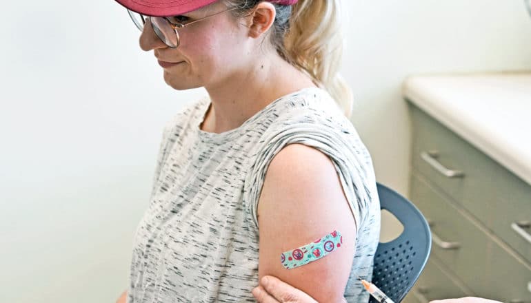 adult woman gets MMR vaccine