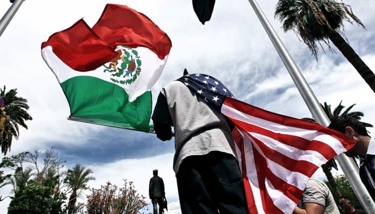 mexican and american flags (immigrants concept)