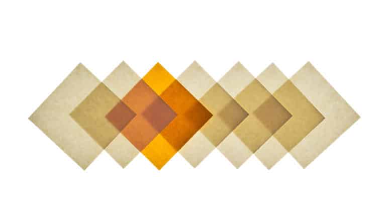 overlapping squares of beige and orange paper