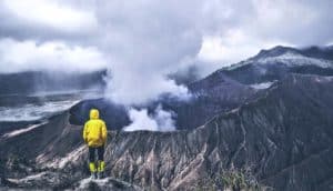person looking at volcano