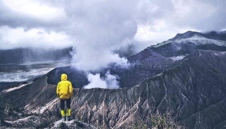 person looking at volcano