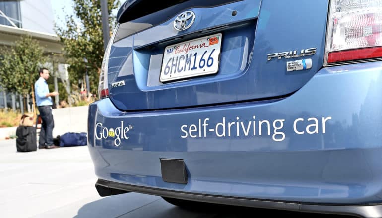 rear bumper of blue prius self-driving car