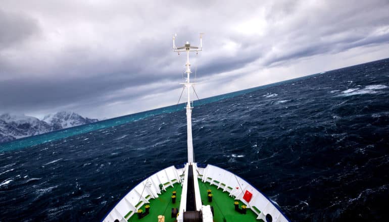 ship in rough Antarctic ocean