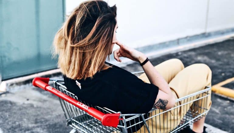sitting in shopping cart