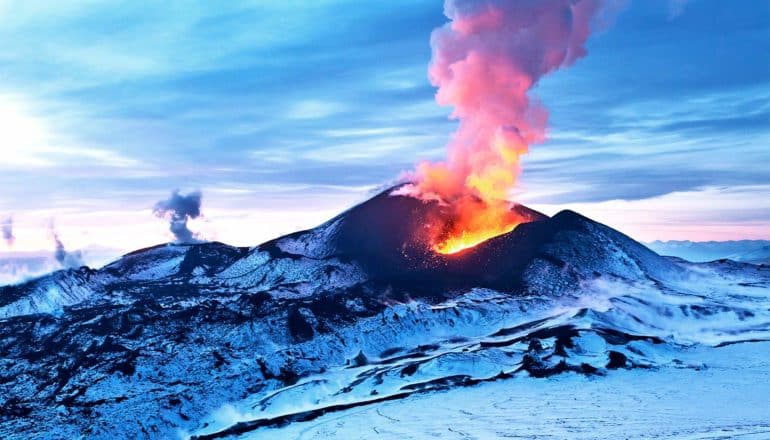 volcano line in snowing landscape (climate concept)