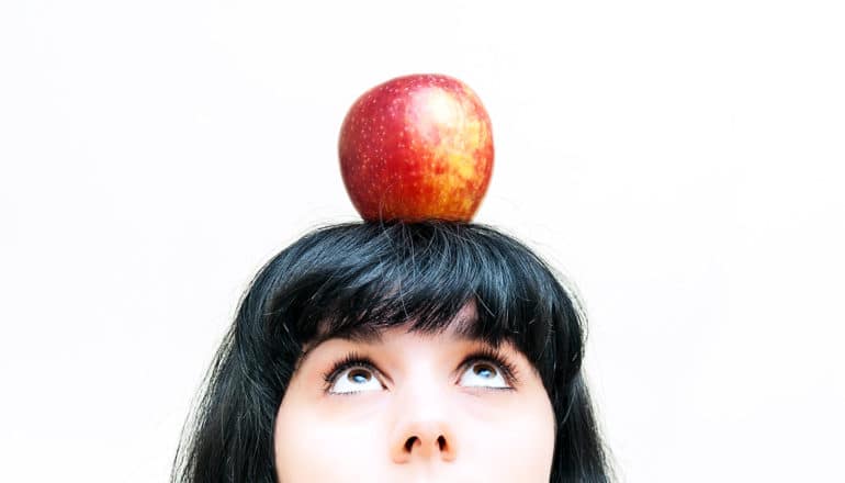 apple on head (genetically modified foods concept)