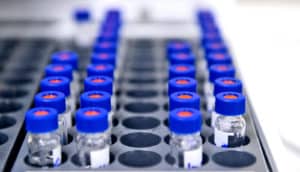 blue lids on lab phials