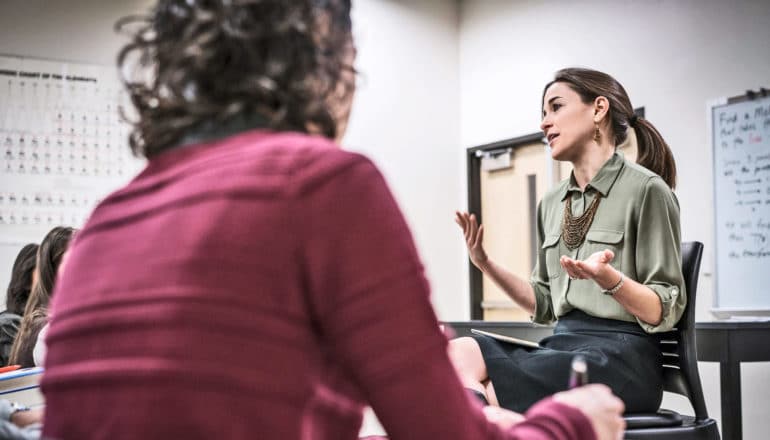 woman instructor speaking in classroom