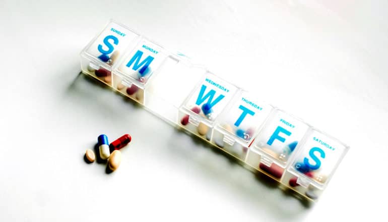 pill box with one day open (antibiotics concept)