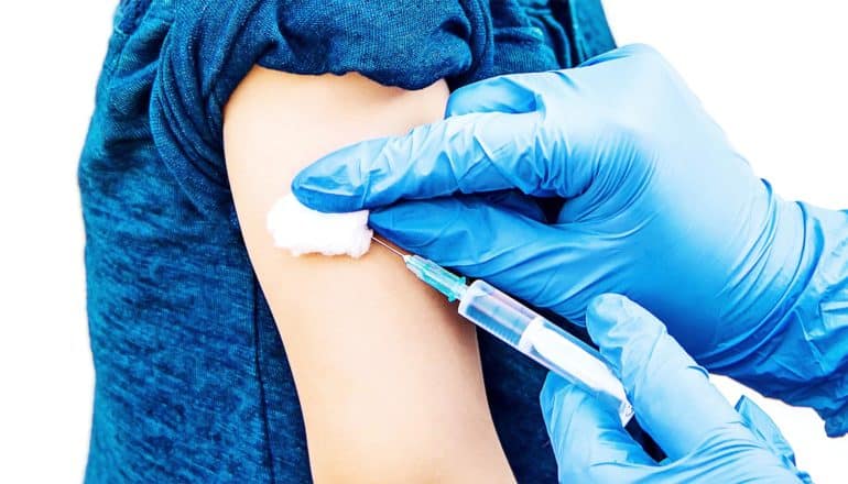 vaccine needle child (hepatitis b vaccine concept)