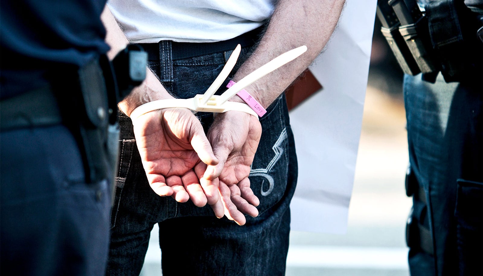 Share by Twitter. zip tie handcuffs in arrest. 