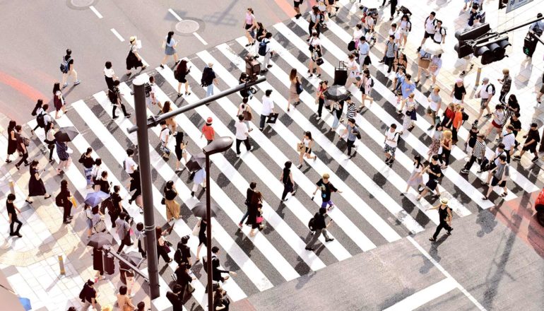 Aerial shot of crosswalk (population concept)