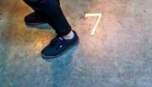 heart disease risk: feet by number 7 on cement floor